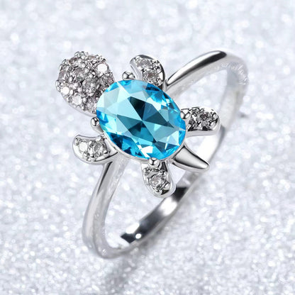 Platinum Ring With A Colored Tortoise Design Featuring Blue Diamondsunisex