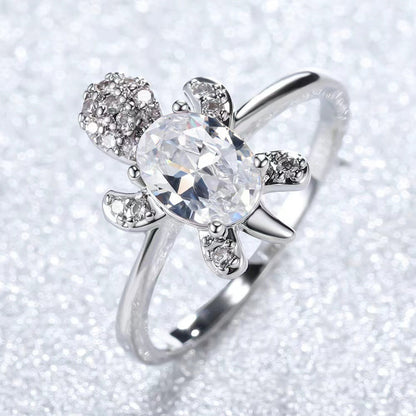 Platinum Ring With A Colored Tortoise Design Featuring Blue Diamondsunisex