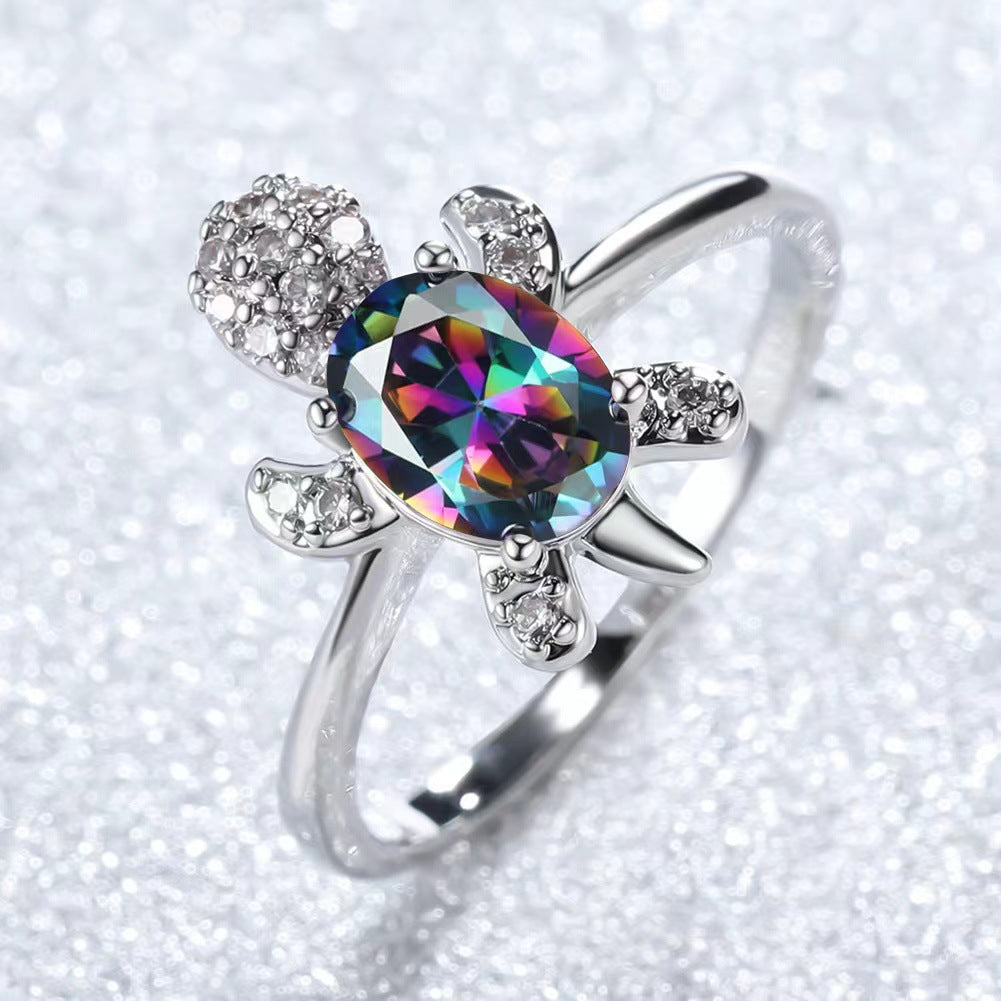 Platinum Ring With A Colored Tortoise Design Featuring Blue Diamondsunisex